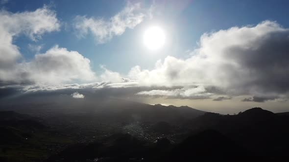 Aerial Footage Through the Clouds Above Green Hills