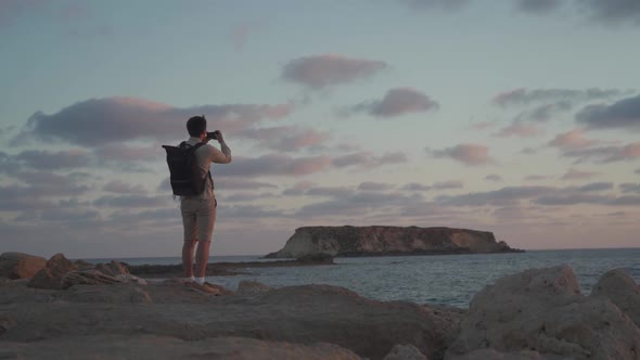 Tourist Takes Pictures of Beautiful Views of Nature on Island of Cyprus on Mobile Phone While