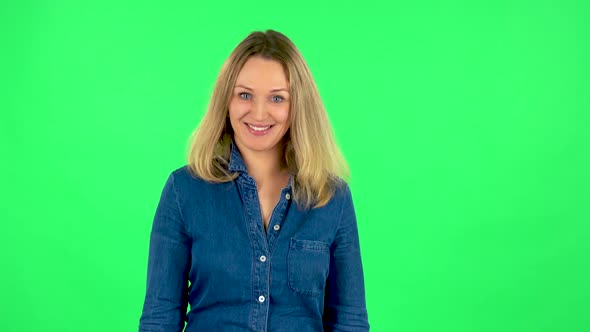 Portrait of Fair Woman Is Making Sign Ok. Green Screen