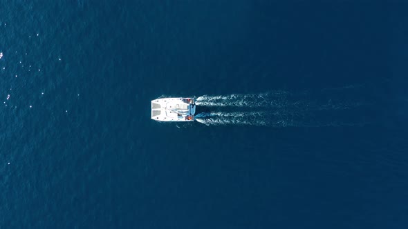 Croatia. Aerial view of luxury floating boat on blue Adriatic sea at sunny day.