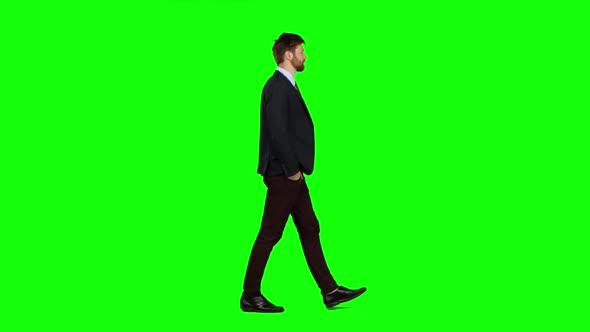 Man Walks Calmly Down the Street, He Is Happy. Green Screen