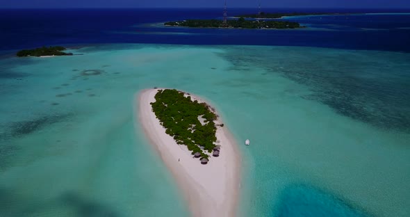 Tropical above abstract view of a sunshine white sandy paradise beach and aqua turquoise water backg