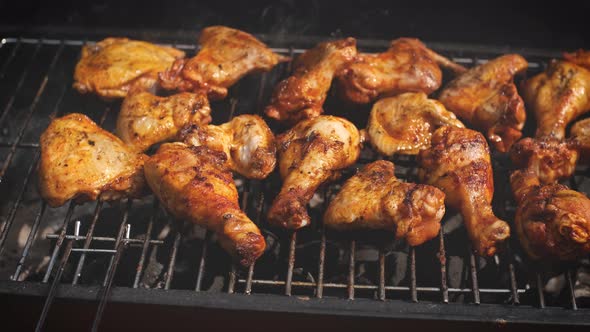 Delicious Chicken Pieces Frying on Barbecue Grill