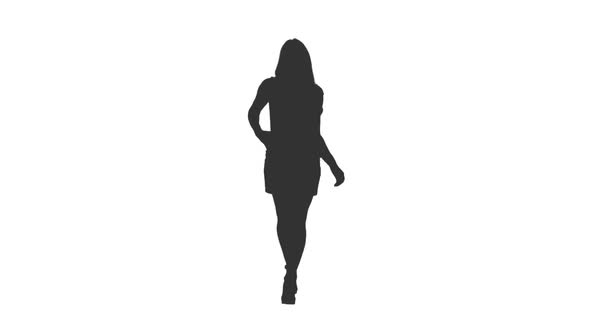 Silhouette of Young Woman Walking in Mini Dress  alt