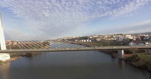 The Beautiful and Peaceful View Of Rainha Santa Isabel Bridge in Coimbra, Portugal - Aerial Shot