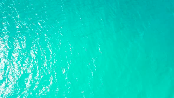 Aerial drone panorama of luxury bay beach break by clear sea and white sandy background of a dayout 