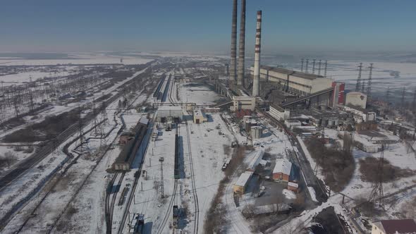 Aerial View of High Chimney Pipes with Grey Smoke From Coal Power Plant