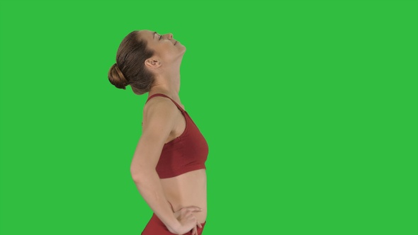 Female walking and doing neck stretching exercise to release