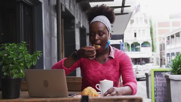 African american sitting in a cafe