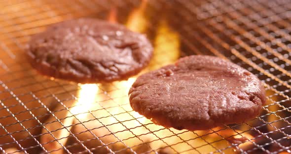 Beef Burger on Barbecue Metal Net