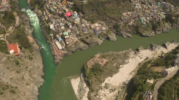 Devprayag, India, alakananda and bhagirathi holy rivers mix to become ganges, 4k aerial drone view