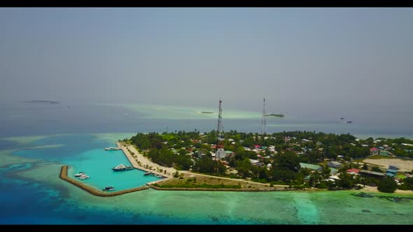 Aerial drone nature of idyllic resort beach holiday by blue lagoon with white sandy background of jo