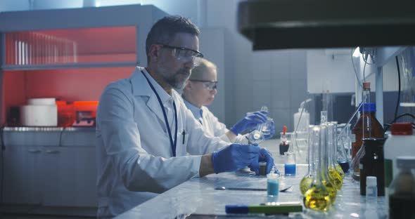 Scientist Working at Laboratory