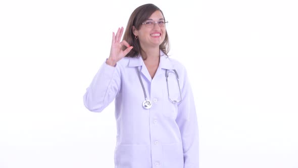 Happy Beautiful Woman Doctor with Ok Sign