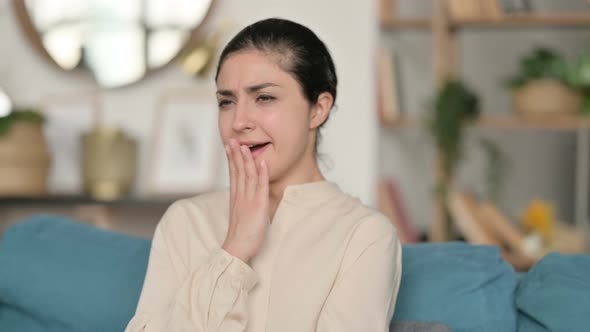 Sleepy Indian Woman Yawning at Home 