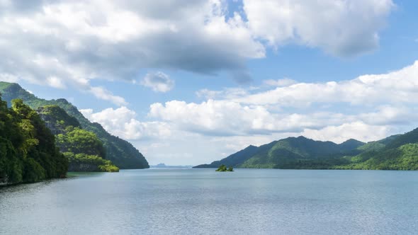 Beautiful lake reservoir and mountain in Kanchanaburi, Thailand - Time Lapse