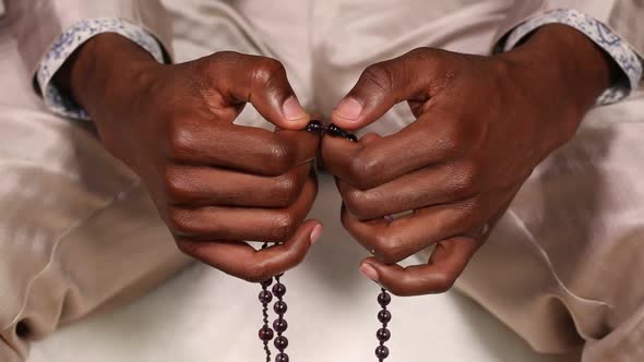 Hands with Beads