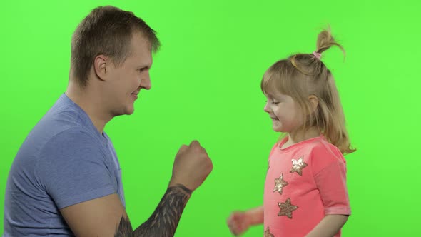 Father and Little Daughter Playing Rock Paper Scissors. Chroma Key. Leisure Game