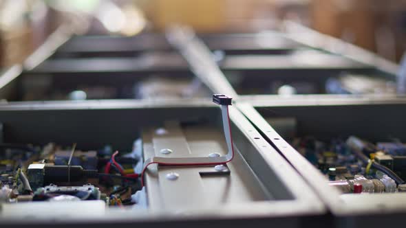 Slider Shot of a Metal Components and Microcircuits in Workshop Laboratory