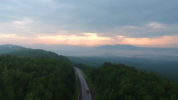 Aerial view The Road At Dawn In The Mountains