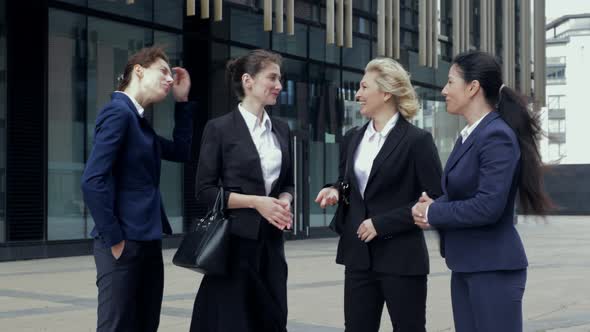 Front View of Female Colleagues Group Talking at Work Break, International Business Women Have