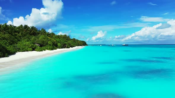 Aerial flying over nature of perfect coast beach break by clear ocean with white sand background of 