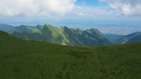 Mother With Daughters Hiking By The Fagaras Ridge 