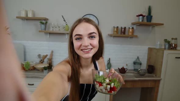 POV Shot of Blogger Girl Making Photos, Taking Selfies with Salad for Social Media on Mobile Phone