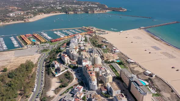 Delightful Aerial View of the Portuguese City of Portimao at the Seaport for Moored Yachts and Ships