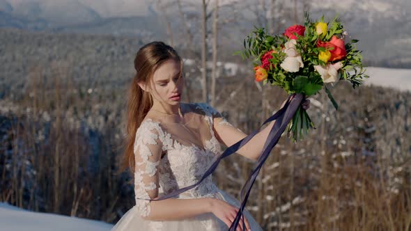 Bride with a Bouquet of Flowers