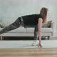 Young attractive woman with prosthetic leg does stretching exercise - VideoHive Item for Sale