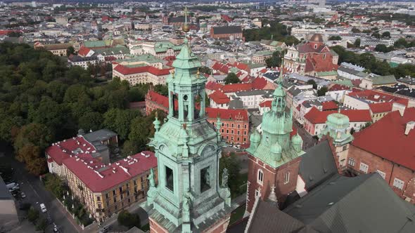 Aerial view of the Wawel Cathedral and the Krakow old town in the background on a sunny day. Krakow,