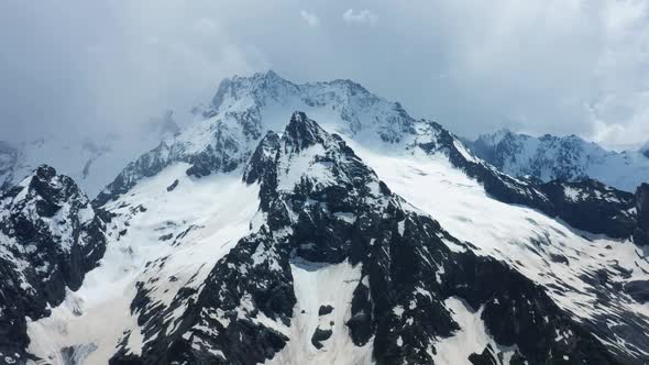 Aerial View from an drone of Beautiful Snowy Caucasus Mountain Landscape in Winter