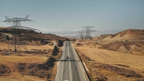 Aerial Highvoltage Power Lines Over Highway Road alt