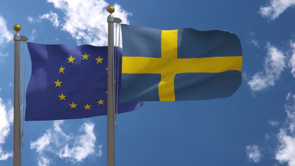 European Union Flag Vs Sweden Flag On Flagpole