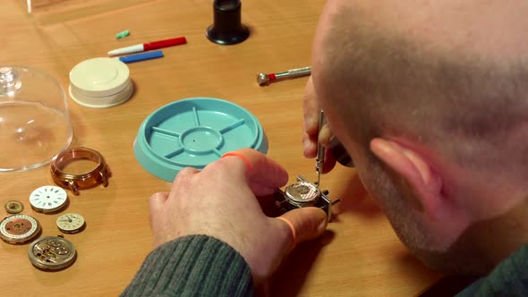 Clockmaker Disassembles Clock