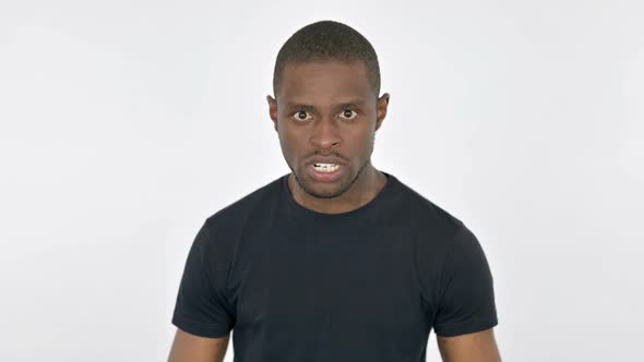 Angry Young African Man Want Revenge on White Background