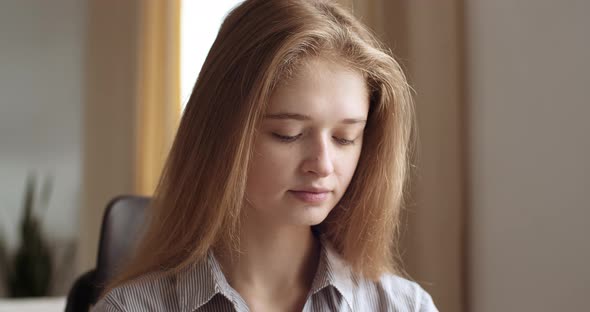 Portrait of Pensive Young Woman Worker Manager Confidently Looks Into Camera. Headshot Teenager Girl