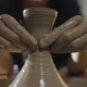 Female Hands Form Neck of an Earthenware Jug From White Clay on Potter's Wheel - VideoHive Item for Sale