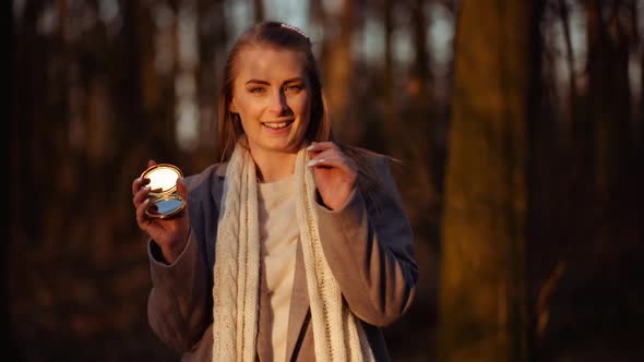 Woman Reflects Light with a Small Mirror