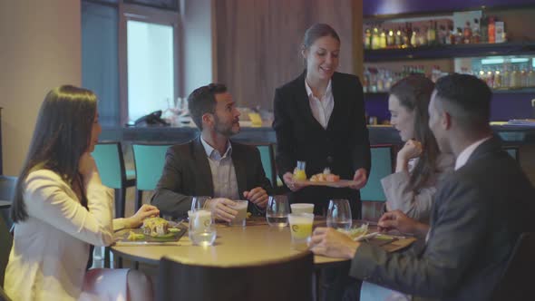 Friends dining together in restaurant