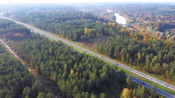 Latvia, A2 Highway Autumn Landscape From Above. Gauja River With Bridge and Ramkalni in Background.