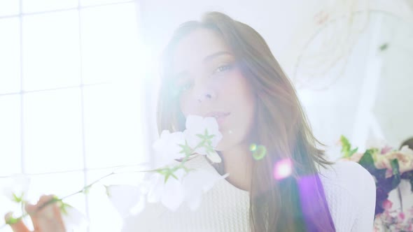 Young Beautiful Girl in White Decor