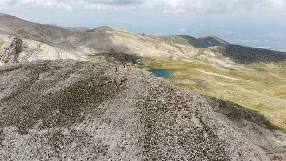 Climbers on Top of The Mountain Peak