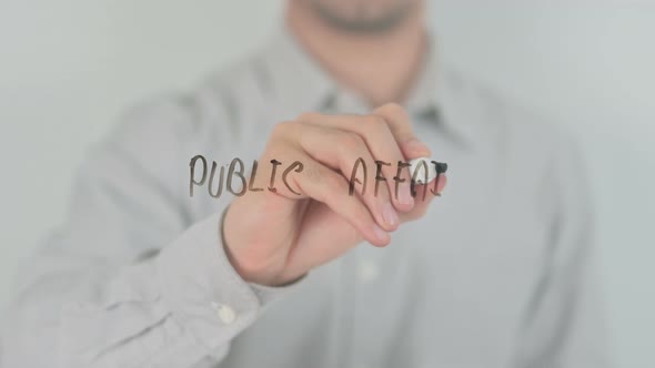 Public Affairs Writing on Screen with Hand