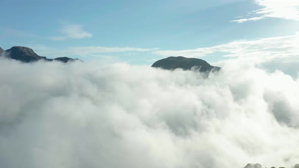 Mountain Peaks Visible Under Thick Clouds In Mulshi, India