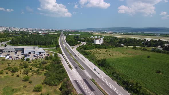 Highway Among Green Fields Aerial View