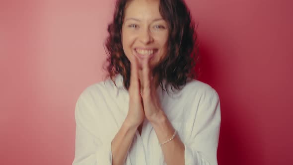 Happy Fun Beautiful Young Woman in White Shirt Posing Isolated on Pink Background in Studio