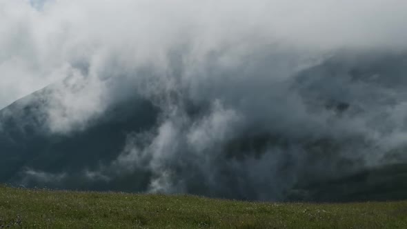 Fast Moving Dramatic Clouds in Mountains