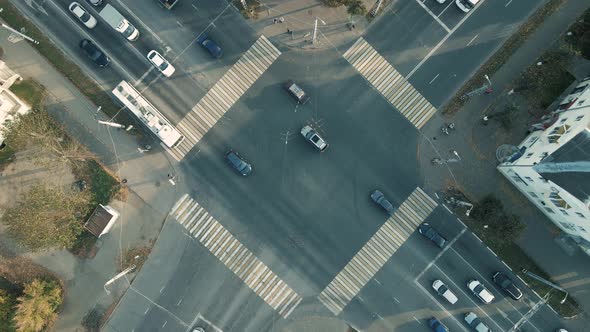 A Large City Intersection in the Morning Cars are Actively Driving